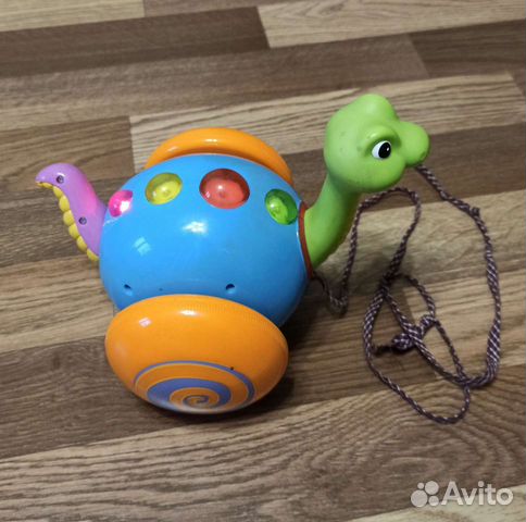 Развивающая игрушка. Каталка музыкальная