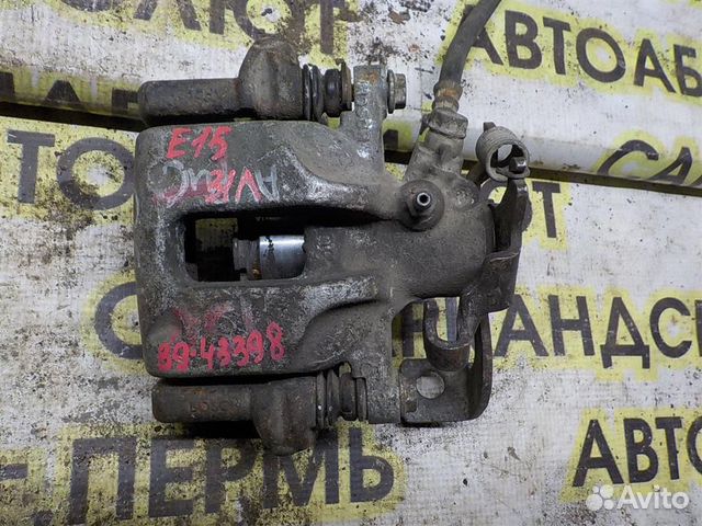 Суппорт задний левый Toyota Corolla (E150) 2006-2