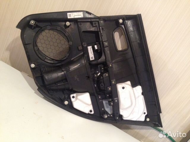 Обивка задней левой двери Мазда 3 2008г. седан
