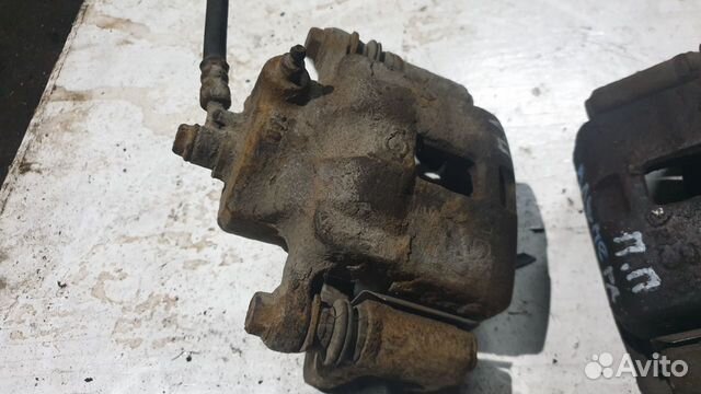 Суппорт передний левый ниссан альмера n 15 GA16