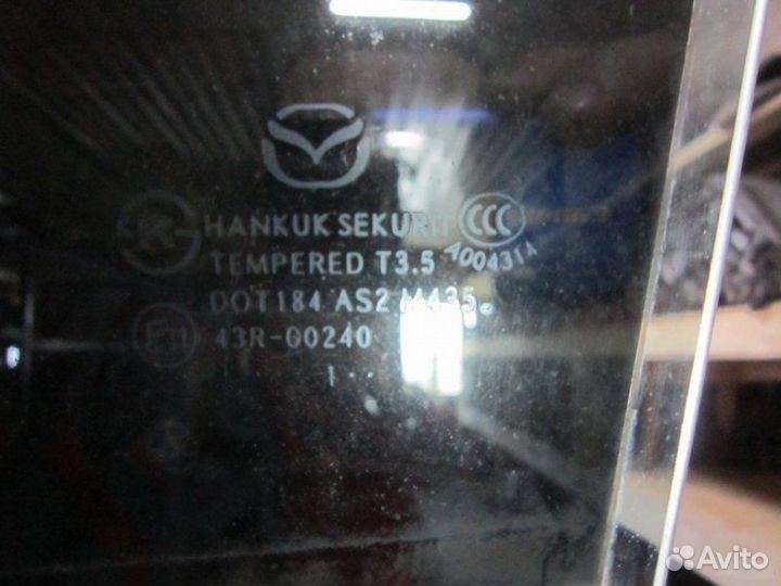 Стекло двери задней левой Mazda 3