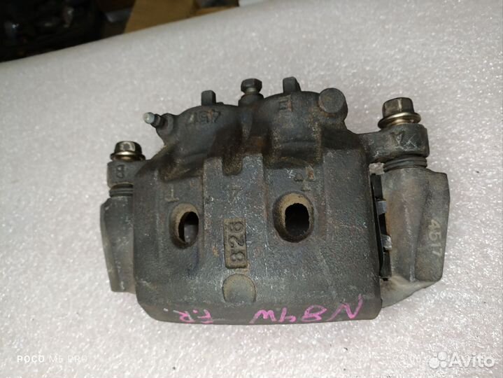 Суппорт тормозной пер. Mitsubishi Grandis chariot