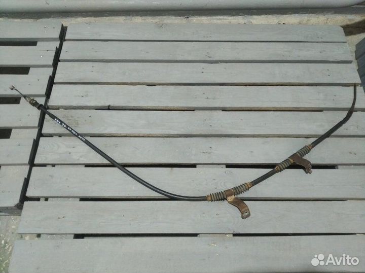 Трос стояночного тормоза левый Chevrolet Lacetti