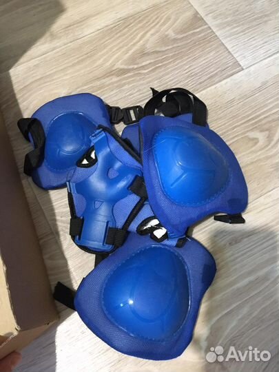 Роликовые коньки