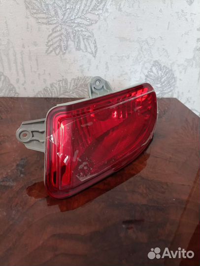 Фонарь противотуманный задний киа рио2 левый новый