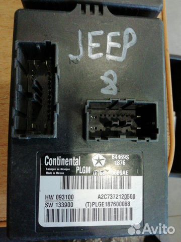 Блок управления дверьми Jeep Grand Cherokee 200