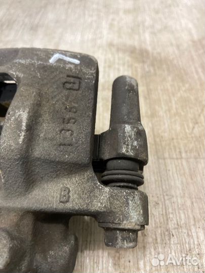 Суппорт задний левый Mitsubishi Lancer 10 CY3A