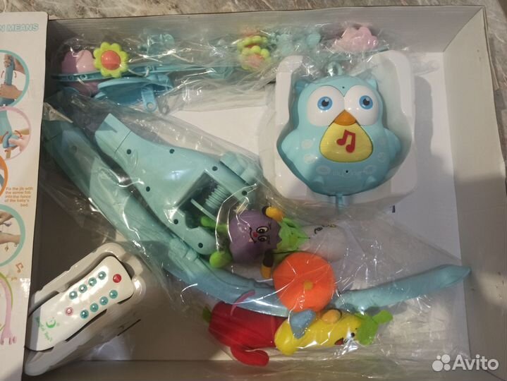 Мобиль на кроватку новый с пультом и проектором