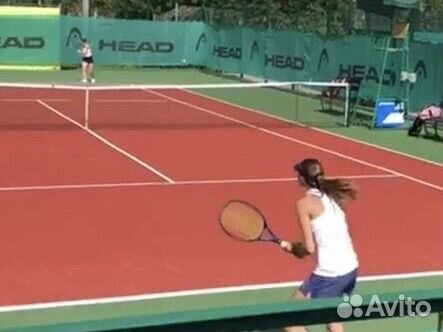 Тренер по большому теннису