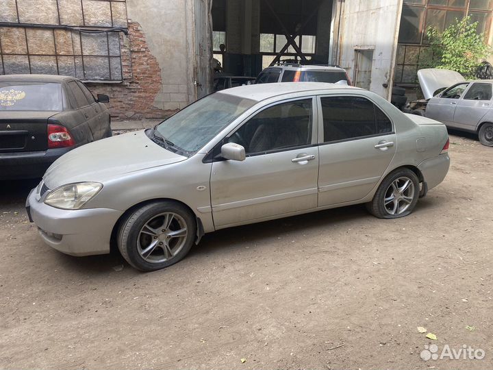 В полном разборе Mitsubishi Lancer 9 1.6 2006год