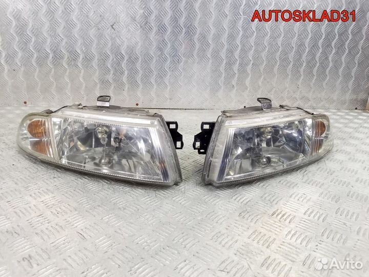 Фара левая правая Mitsubishi Carisma DA MR485383