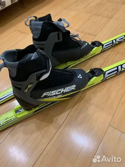 Беговые лыжи fischer с ботинками и палками
