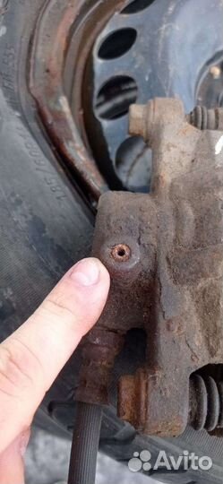 Суппорт задний левый Митцубиси Лансер 9