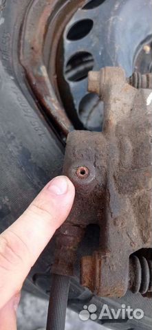 Суппорт задний левый Митцубиси Лансер 9