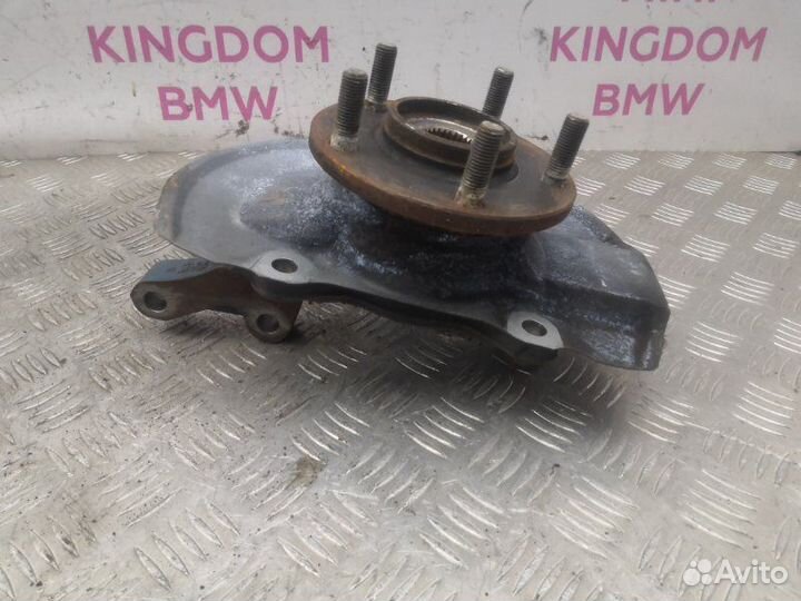 Поворотный кулак передний левый Mitsubishi Lancer