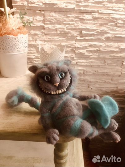 Чеширский кот из Асилы в стране Чудес