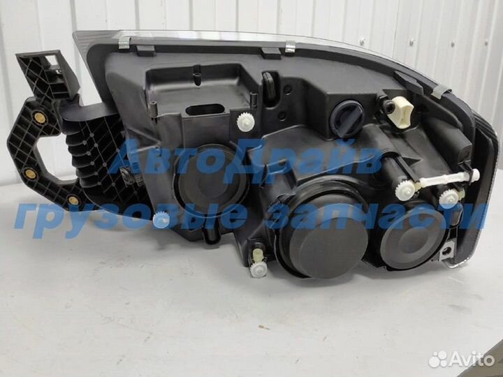 Фара головного света Рено Премиум левая