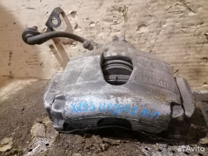 Суппорт тормозной передний правый Renault Megane