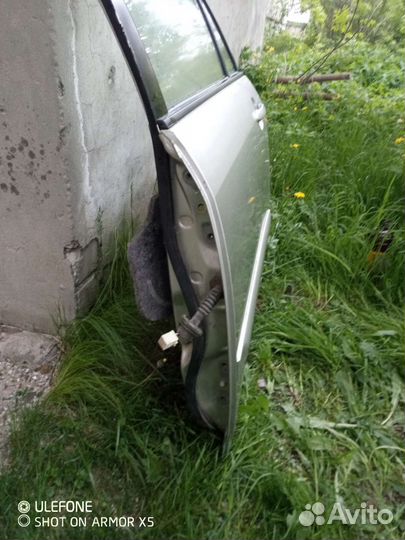 Toyota corolla 120 дверь