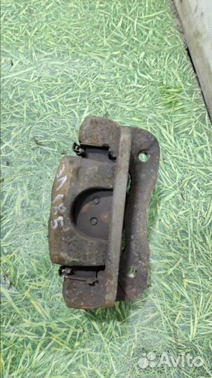 Суппорт задний левый Hyundai Tucson хэтчбек 2.0