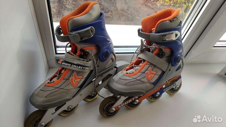 Роликовые коньки
