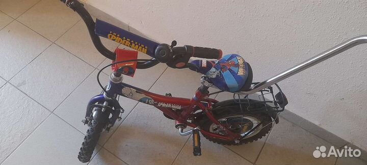 Детский четырехколесный велосипед с ручкой