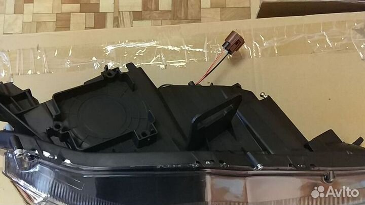 Фара левая Mitsubishi Lancer X