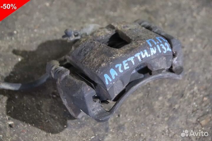 Суппорт передний правый Шевроле Лачетти