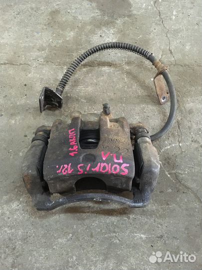 Суппорт передний левый (Hyundai Solaris, Kia Rio)