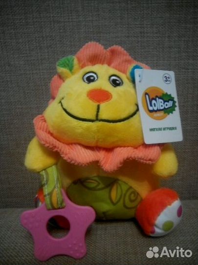 Детская игрушка -погремушка на коляску