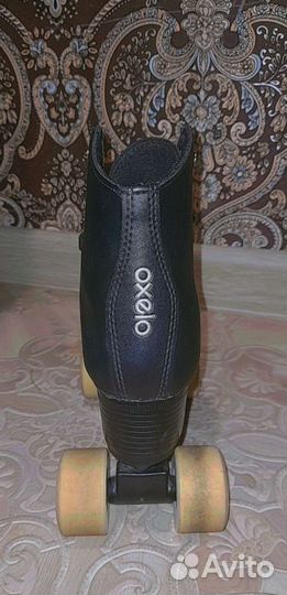 Роликовые коньки