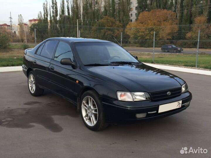 Лобовое стекло Тойота Карина Е