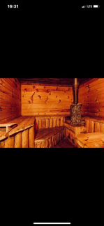 Баня внутри дома на дровах