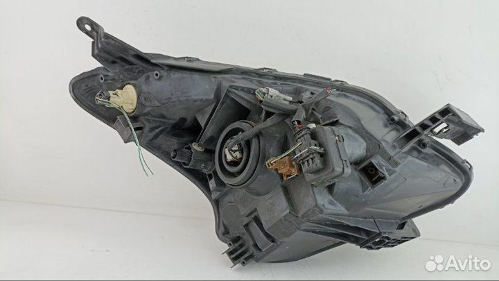 Фара левая Toyota Ractis NCP100