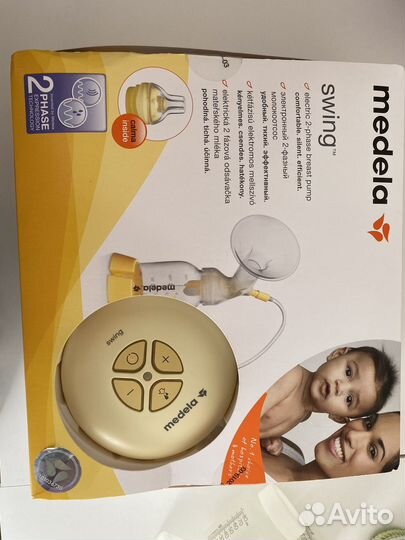 Молокоотсос medela электрический