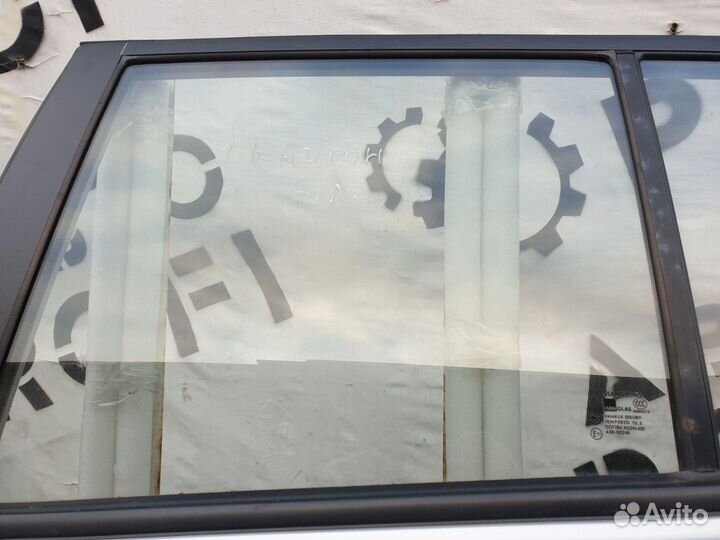 Стекло двери заднее левое Ssang Yong Kyron