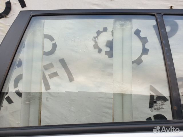 Стекло двери заднее левое Ssang Yong Kyron