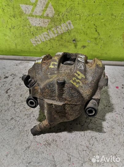 Суппорт передний левый бмв Е34