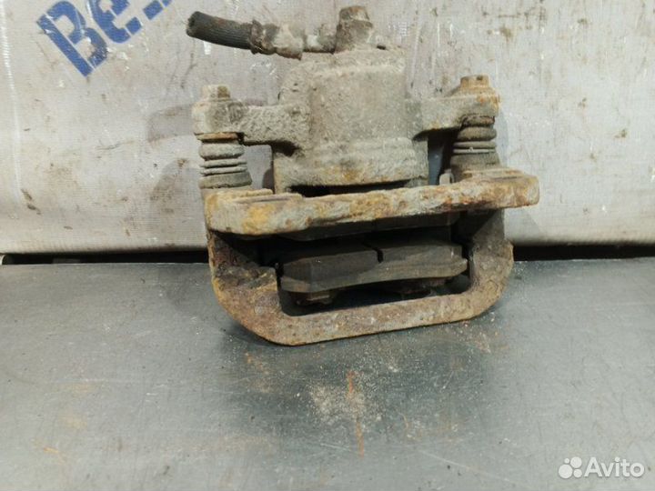 Суппорт тормозной задний правый Chevrolet Lacetti