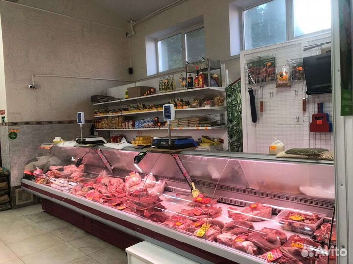 Продавец мясо