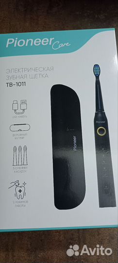 Электрическая зубная щетка