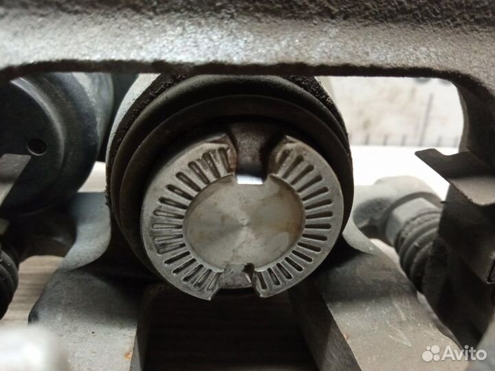 Суппорт тормозной задний правый Kia Sportage QL