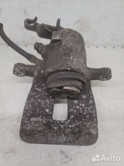 Суппорт задний левый Skoda Octavia A5 1Z