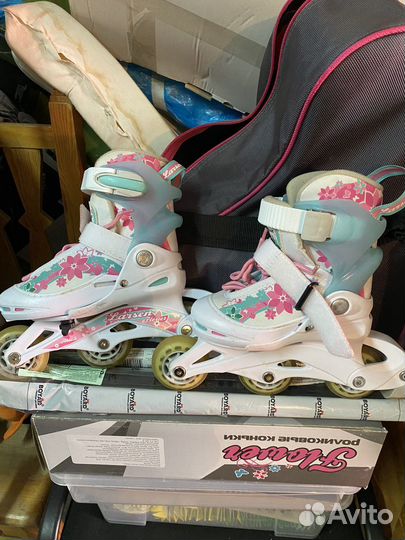 Роликовые коньки