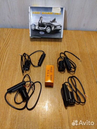 Лазерная проекция логотипа под двери авто