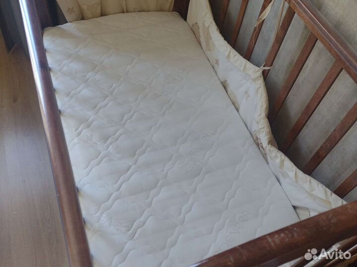 Детская кроватка с маятником Можга