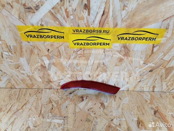 Отражатель в бампер задний левый Nissan Almera