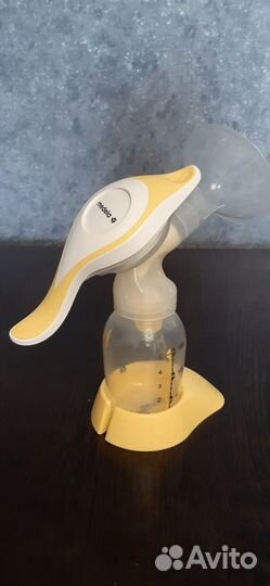 Молокоотсос medela ручной