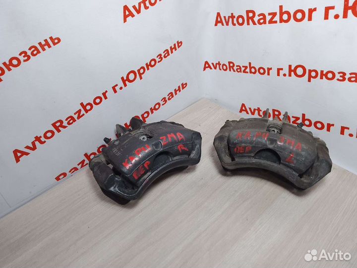 Суппорт передний Mitsubishi Carisma