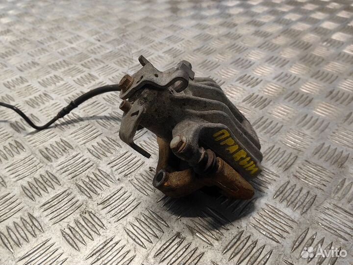 Суппорт тормозной задний правый Skoda Rapid